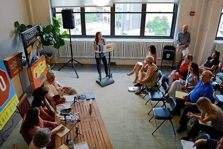 a book reading seen from above