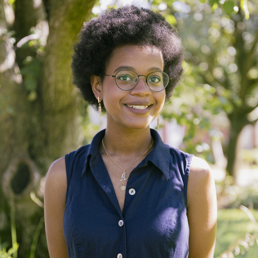 Asia Jannah portrait outside by a tree